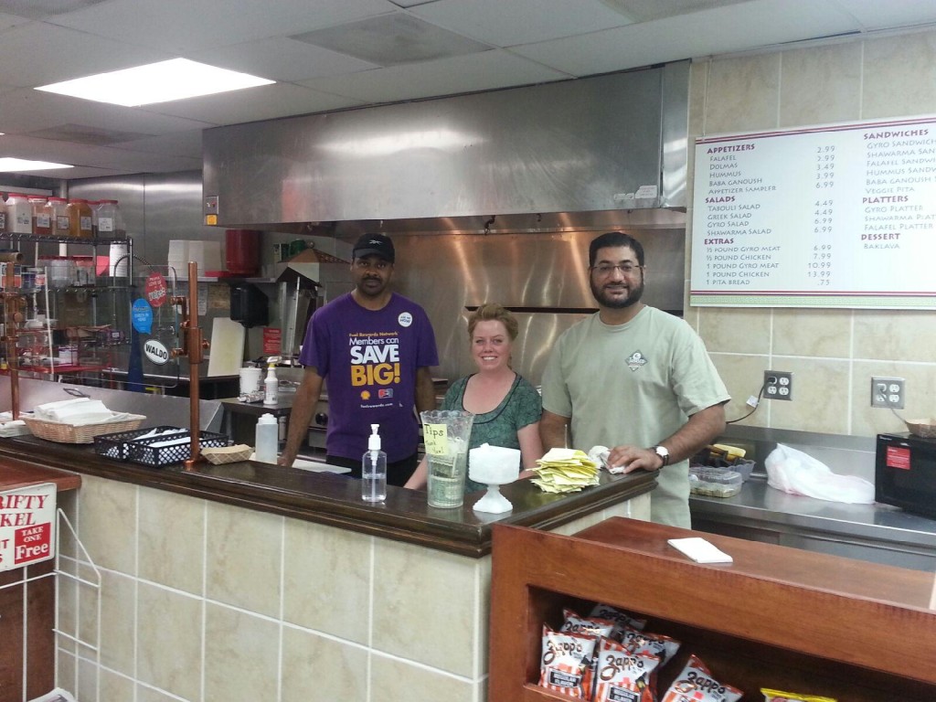 Team Papu- left to right, Tim Johnson, cook, artist in residence & waitress, Carrie Belker and owner Shuja Sirhindi.